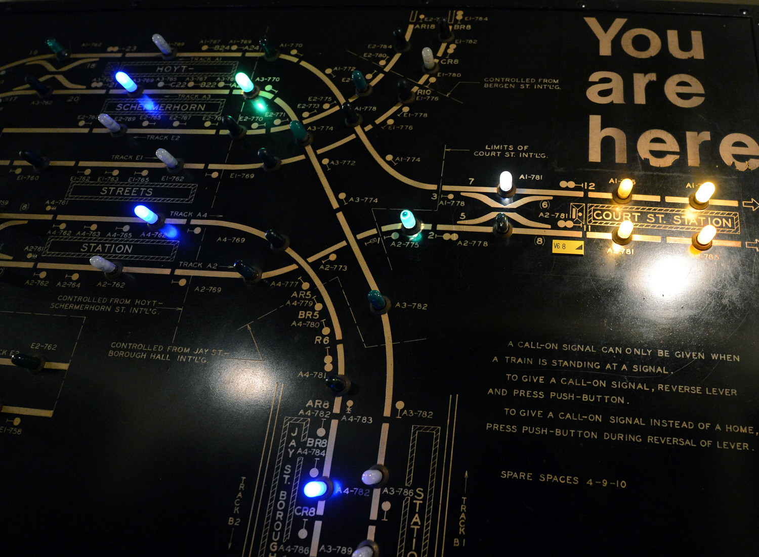 Close up of signal board from Transit Museum. Colored lights indicate train positions in the system.