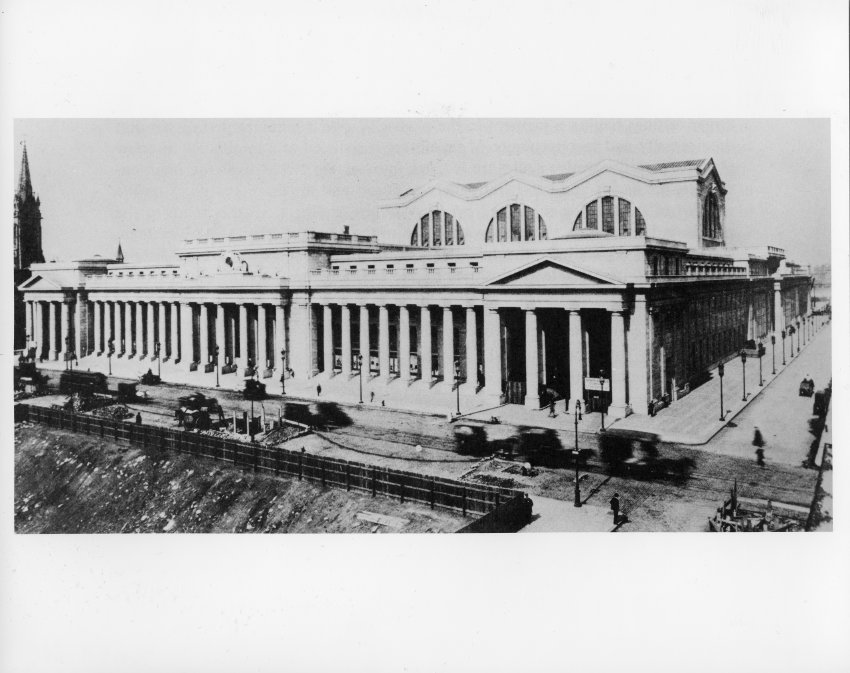 Pennsylvania Station with horse and gas powered vehicles in front. Photograph from around 1910.